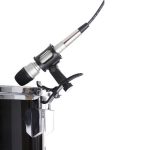 Drum microphone mounted on a tom with a shock mount and a clamp